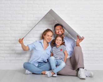 couple-holding-house-roof