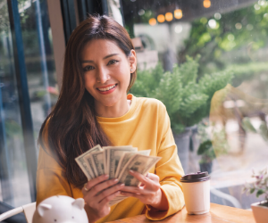 woman-holding-money